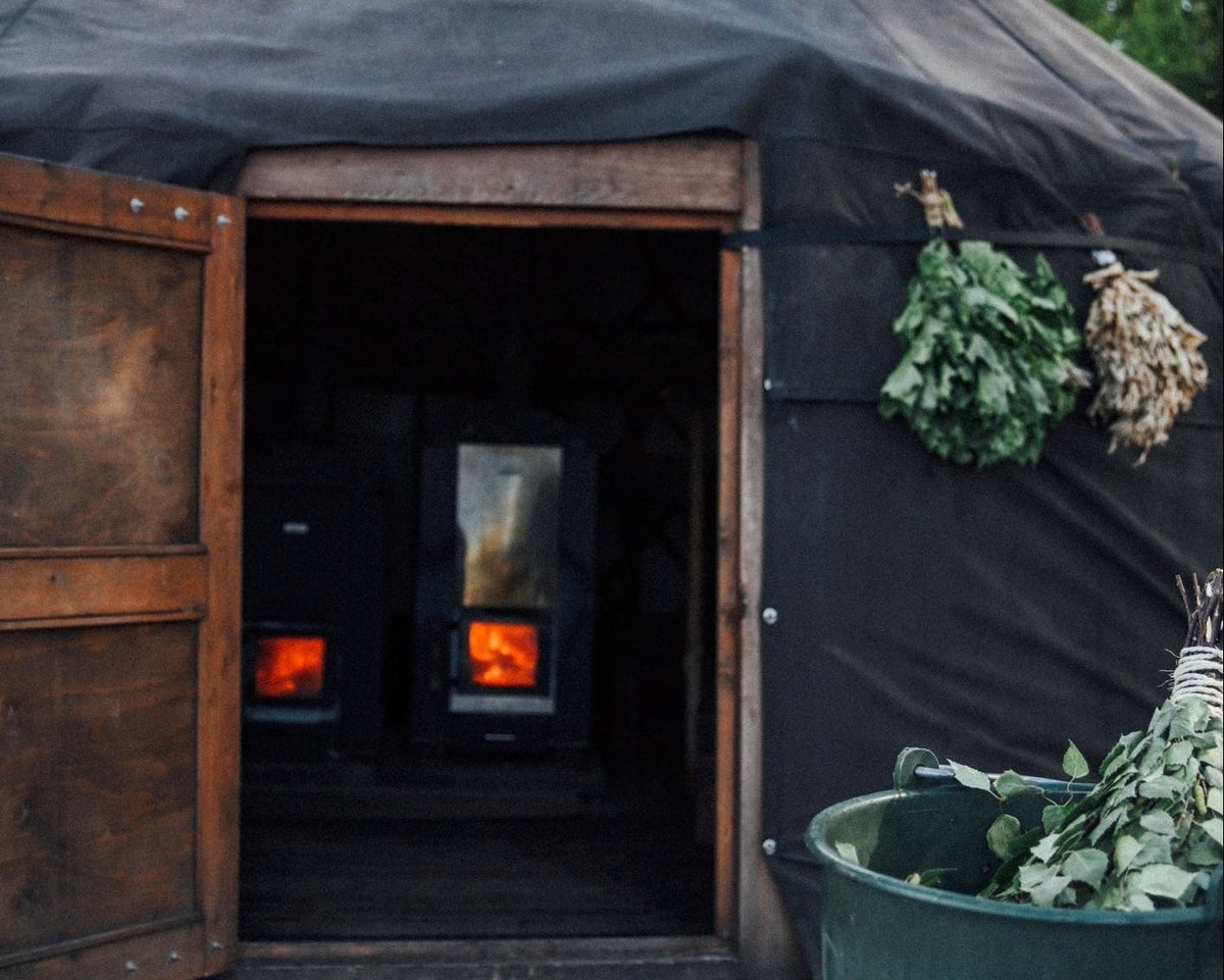 Traditional Finnish sauna ritual in a yurt sauna